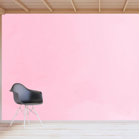 Easy Peasy Peel And Stick Waterproof PVC Pink Wallpaper Roll A Real Game Changer For Cabinet Refresh And Bath Walls Super Durable Oil Proof Finish Built Tough For Daily Use on a pink wall with a chair.