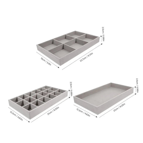 Three Piece Multi Grid Jewelry Organizer Trays Featuring Earring Stands Necklace Display Plates And Soft Velvet Ring Inserts To Make Sorting Your Bling A Breeze For Home Or Showroom Use, grey trays with multiple compartments.