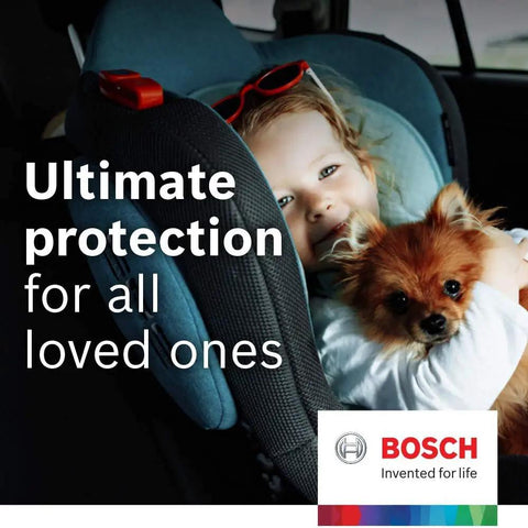 Child in car seat with dog, Bosch logo, text reads 'Ultimate protection for all loved ones'. Image promoting safety features.