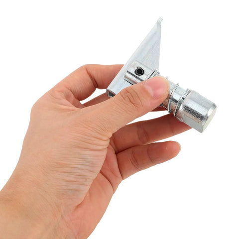 Hand holding a silver massive heavy duty forklift locating pin with thickened body for stability and impact resistance.