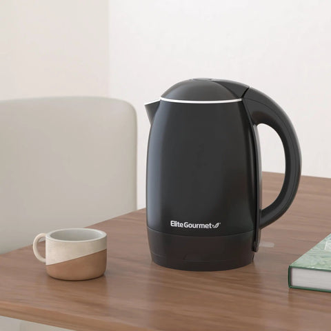 1.8L Double Wall Insulated Kettle With Cool Touch Exterior on table, visible stainless steel interior lid, 360 swivel base, black