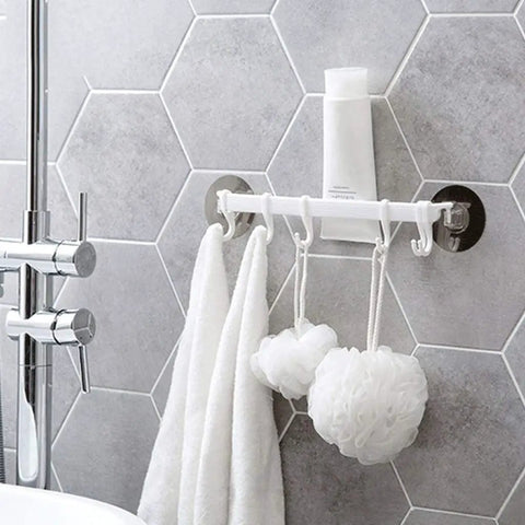 No Drill Hassle Self Adhesive Towel Rack Wall Mount Hook With Hella Strong Grip For Bathroom Kitchen And Living Room Totally Rad Space Saving Storage Solution Smooth Finish with towels and bath accessories hanging.