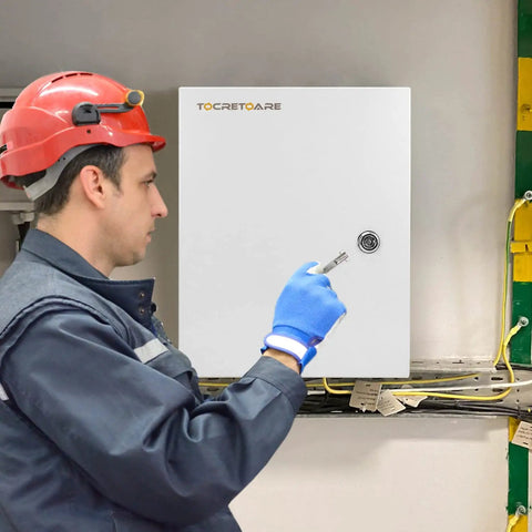 Technician inspecting Outdoor Electrical Junction Box 12 X 10 X 6 Inch NEMA 4X Enclosure Wall Mounted IP66 Waterproof