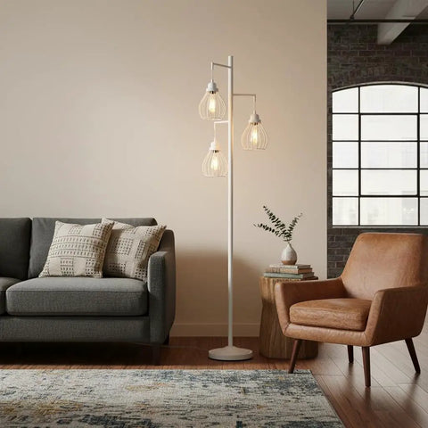 Teardrop Modern LED Floor Lamp With Three Cage Shades For Bedroom Office And Living Room next to sofa and armchair