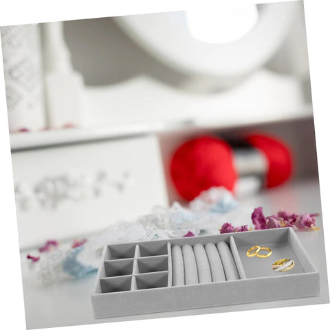Chic Five Grid Jewelry Organizer Tray For Dresser Drawer With Cozy Flannel Interior And Polished Faux Leather Exterior showcasing rings in a grey tray.