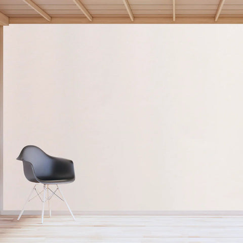 Easy Peasy Peel And Stick Beige Waterproof Wallpaper Roll Self Adhesive Wall Cover on a smooth wall beside a modern chair.