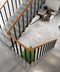 Top-Tier 30-Pack Square Metal Stair Railing Spindles With Full Hardware Kit For Deck Balcony Staircase Banister System 33-Inch Height side view on staircase