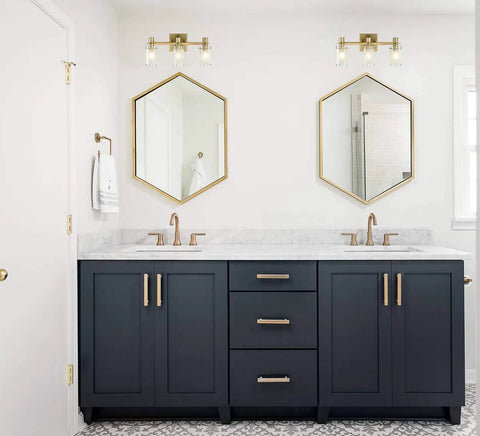 Three Light Vanity Wall Sconce With Explosion-Proof Frosted Glass Shade above bathroom mirrors, gold plated modern bath fixture.