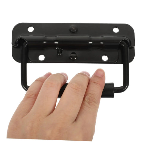 Hand gripping Heavy Duty Stainless Steel Spring Folding Chest Handle For Toolbox Replacement in matte black finish.