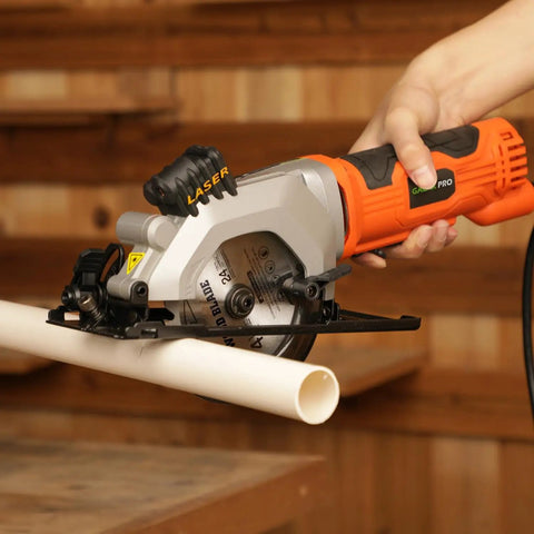 Heavy Duty Mini Circular Saw With Beefy 4 Amp Motor And Crisp Laser Sight For Dang Clean Cuts On PVC Laminate Drywall And 2x4s Featuring Slick Dust Collection Port, cutting PVC pipe.