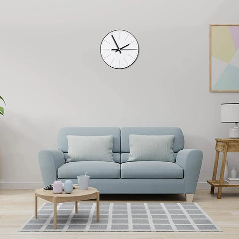 Wall clock made with Six Piece Quartz Clock Mechanism Kit for DIY clock repair above light blue sofa in modern living room.