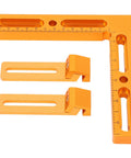 Workhorse Aluminum Alloy Vise Clamps Compatible With T Slot And Perforated Worktables Dead Nuts secure fixtures with orange square and clamps.