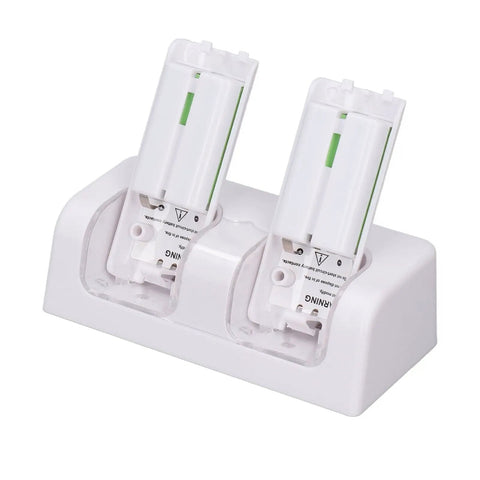Dual Remote Charger Dock With Built In 2800mAh Batteries For Game Consoles And Smart TVs 4 In 1 Remote Charging Station Easy Drop In Recharge Without Battery Swaps Portable ABS Base In White Fast And Efficient Power showing two 2800mAh batteries inserted in white charging dock