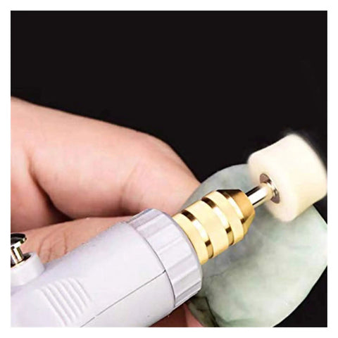 Hand using a rotary tool with Built Tough Wool Buffing Wheels And Grinding Heads With Point Mandrel Kit For Rotary Tools.