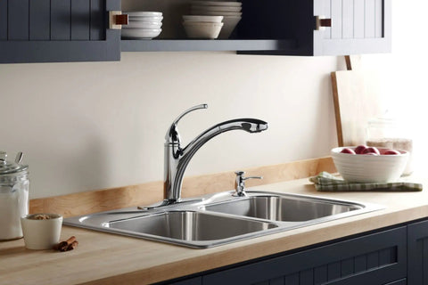 Forté Single-Hole Kitchen Faucet With 9-1/16 Inch Spout, Polished Chrome installed on double sink in modern kitchen