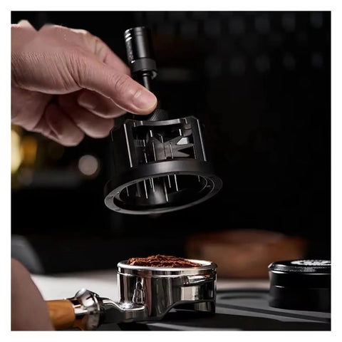 Slick Pro Grade Heavy Duty Adjustable Rotary Espresso Tamper And Coffee Distribution Spoon Levels Grounds Smooth For 51Mm 54Mm 58Mm Portafilters, in hand above coffee grounds.