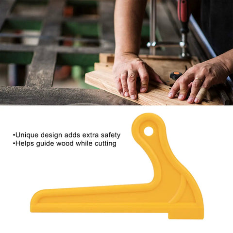 Badass Two Pack V Shaped Push Blocks For Woodworking Safety ergonomic yellow push block guiding wood during cutting.
