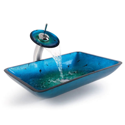 Irruption Blue Rectangular Glass Vessel Sink For Bathroom With Satin Nickel Drain Sleek Modern Look Built To Last Tempered Glass Above Counter Install Scratch And Stain Resistant Easy Clean Polished Interior Standard 1.75 Inch Drain Opening flowing water