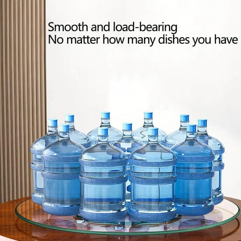 Top Shelf Tempered Glass Lazy Susan Turntable Featuring A Smooth As Butter 360 Degree Swivel Rotation with stacked water bottles.