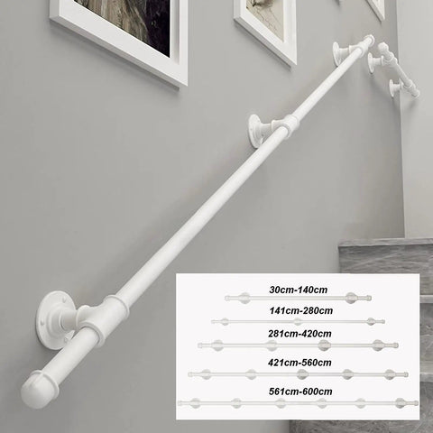 Slick Wrought Iron Handrail For Indoor Outdoor Stairs, 14 foot wall mounted safety banister bar installed on gray wall.