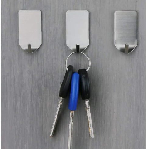 Three stainless steel stick on hat hooks for wall baseball cap rack, one holding keys, waterproof adhesive, heavy duty, no drill.
