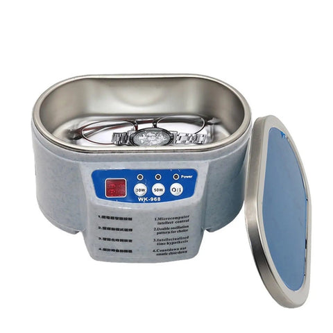 Top Notch Digital Ultrasonic Cleaner Bath For Jewelry Glasses And Manicure Stones Uses Advanced Ultrasound Technology with glasses and a watch inside.