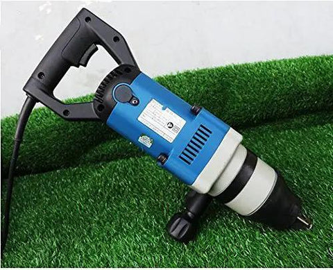 Professional Electric Impact Wrench That Cracks Through Stuck M24 To M30 Bolts With Beefy 588Nm Kick And 1050W Motor Performance for automotive repairs on grass.