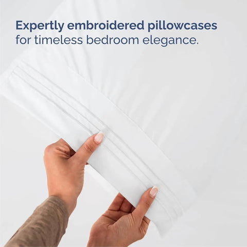 Expertly embroidered pillowcases from King Size Four Piece Sheet Set With Chill Cooling Fabric And Deep Pockets Up To Sixteen Inches.