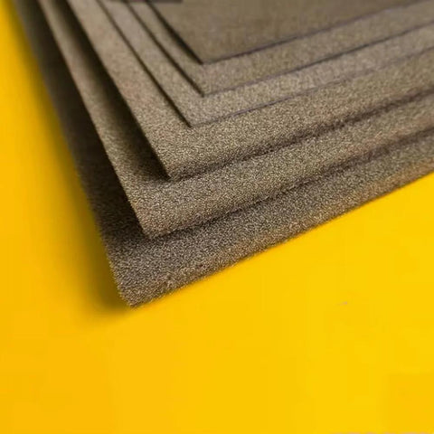 Stacked sheets of conductive foam EMI shielding material
