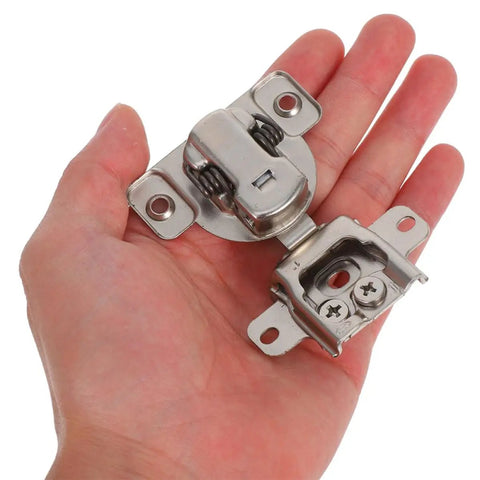 Hand holding Two Pack Metal Cabinet Hinges With Soft Close Concealed Adjustable Folding Design For Inward Opening Electrical Cabinet Doors Smooth Steel