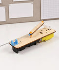 Reciprocating Linkage Linear Motion Demonstrator Kit With Dead Simple Adjustable Stroke And Heavy Duty Wooden Base showing adjustable iron linkage in lab setup.