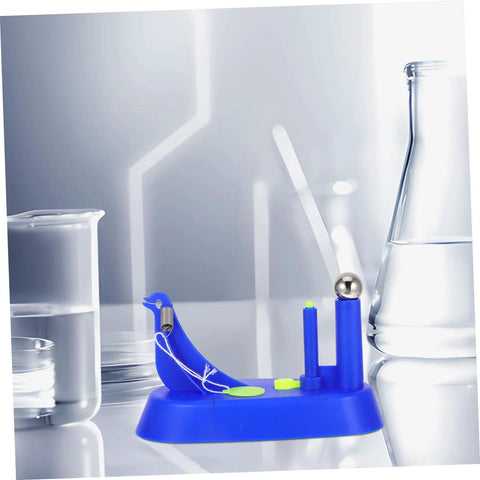 Educational Newtonian Pendulum Swing Tool For Physics Experiments on lab table, blue plastic with metal ball, classroom use.