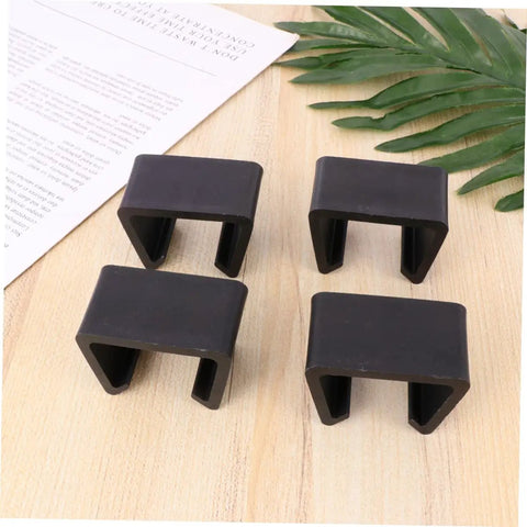 Four Pack Sturdy Chair Clips For Rattan Furniture, Sofa Fasteners And Corner Connectors on wooden surface
