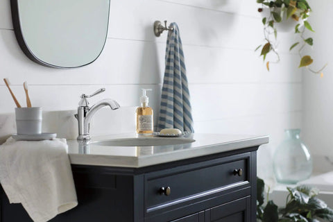 Elmhurst No Fuss Single Handle Bath Faucet Chrome Finish for 1 or 3 Hole 4 Inch Install on modern bathroom countertop.