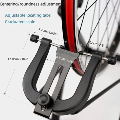 Close-up of Foldable Bike Wheel Truing Stand For 16 To 29 Inch Wheels calibration gauge setup on bike wheel.