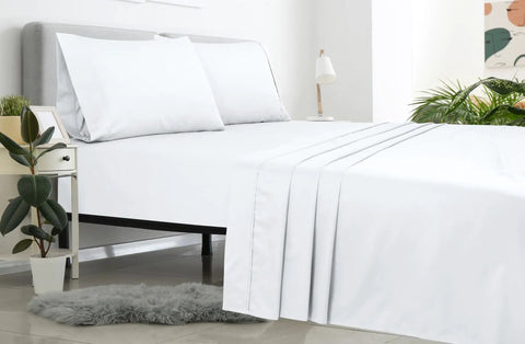 Super Soft Double Brushed Microfiber Full Flat Sheet Only Wrinkle Free Stain Resistant Hotel Quality Top Sheet For Your Full Size Bed In White Super Cozy Breathable 81 By 96 Inches on a neatly made bed.