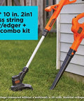 Cordless 20V Max String Trimmer Edger And Sweeper Combo Kit With 10 Inch Cutting Swath leaning against a white shed on grass