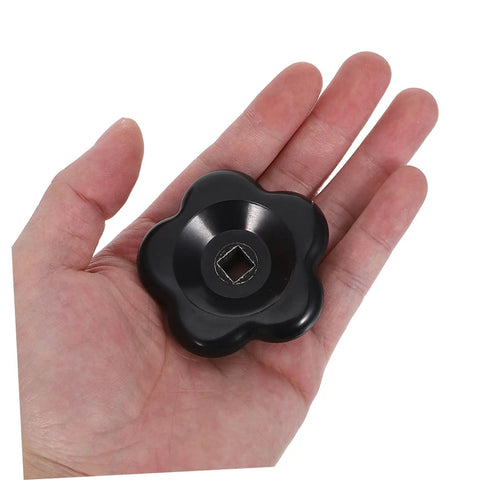 Black Bakelite Spigot Handle Replacement Knobs 6CM 6STAR Fit 8X8MM Stem Hole held in hand shows grip and size