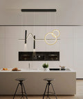 Dope Modern Dimmable Pendant Light With Linear Wave LED Chandelier above a minimalist kitchen island, black and gold finish, 45W fixture.
