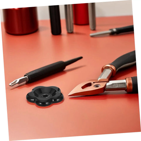 2-Pack Black Bakelite Valve Handwheel Knobs with 60mm butterfly handles, tools for outdoor water spigots, on red surface