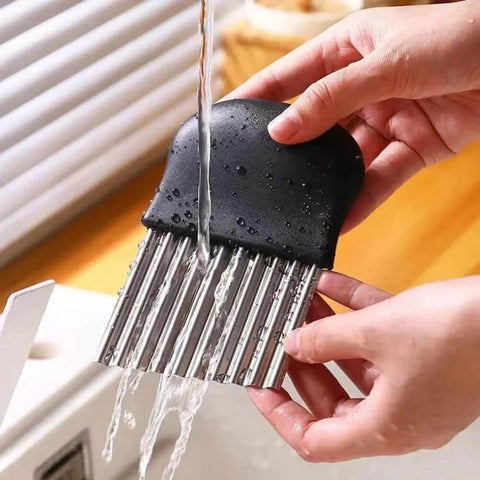 Crinkle cutter with black handle and stainless steel blade for making French fries