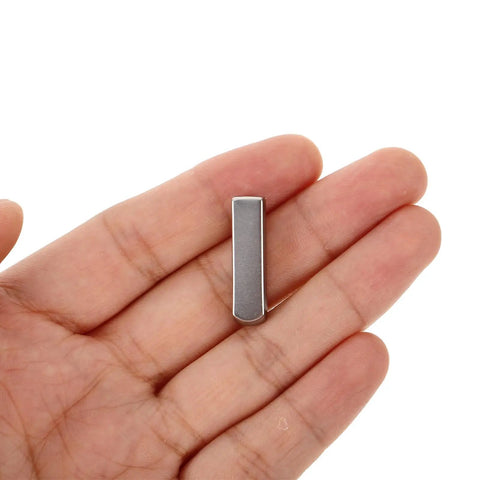 Upgrade Your Daily Drip With Top Tier Metal Alloy Shoe Lace Tips Built To Outlast Worn Aglets Quick Fully Adjustable Cord Ends Fit Any Pair Of Modern Trainers Perfectly - silver metal lace tip held in hand.
