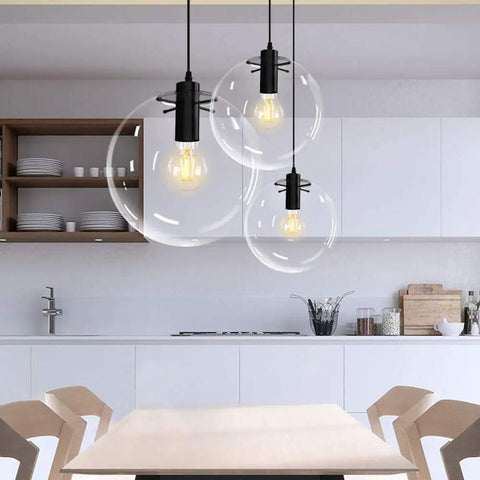 Industrial Clear Glass Globe Pendant Light With E27 Socket in modern kitchen above dining table, 9.8 inch shade