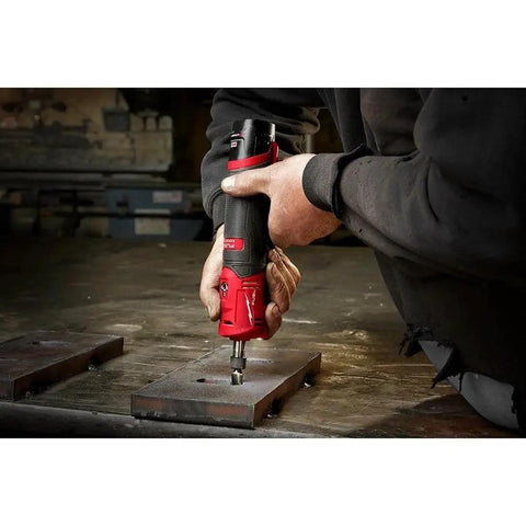 Heavy Duty Compact Straight Die Grinder Kit Compatible With 12v Battery Packs featuring three speed controls in use on metal plate.
