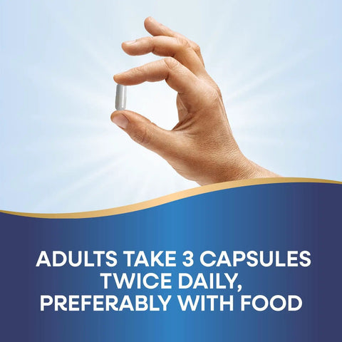 Hand holding a capsule against sky; text advises adults to take 3 capsules twice daily. Calcium Magnesium Vitamin D Supplement For Bone Health And Muscle Function Gluten Free Soy Free No Salt Yeast Derived Ingredients Dairy Free No Artificial Colors Or Flavors