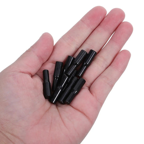 Hand holding 24 Pack Shelf Pins For Cabinets And Wardrobes, 1/4 Inch Carbon Steel Dowel Pins With Rubber Covers for easy DIY installation.