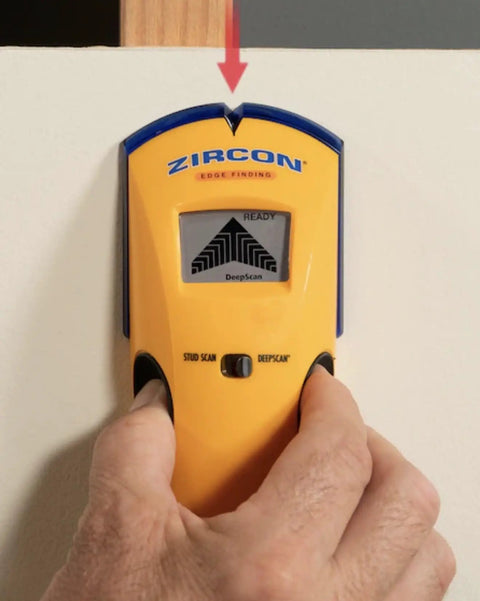 Digital Wall Scanner With Precision Stud Detector And Live Wire Warning Featuring Dual Scan Modes No Sweat Operation For Wood Metal Depth And A Tight Grip That Truly Nails The Best Spots in use on a wall.