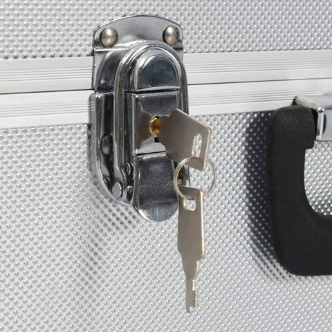 Close-up of lock and key on sturdy aluminum tool case with six extendable trays lockable portable organizer for tools durable silver storage box.