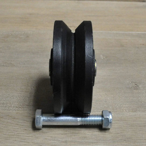 Heavy-duty 4-inch V-groove gate wheel with axle bolt and nut for rolling gates.
