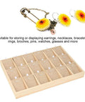 Premium Pine Wood Jewelry Display Tray With Eighteen Velvet Lined Slots showcasing earrings and necklaces arranged in 18 slots.